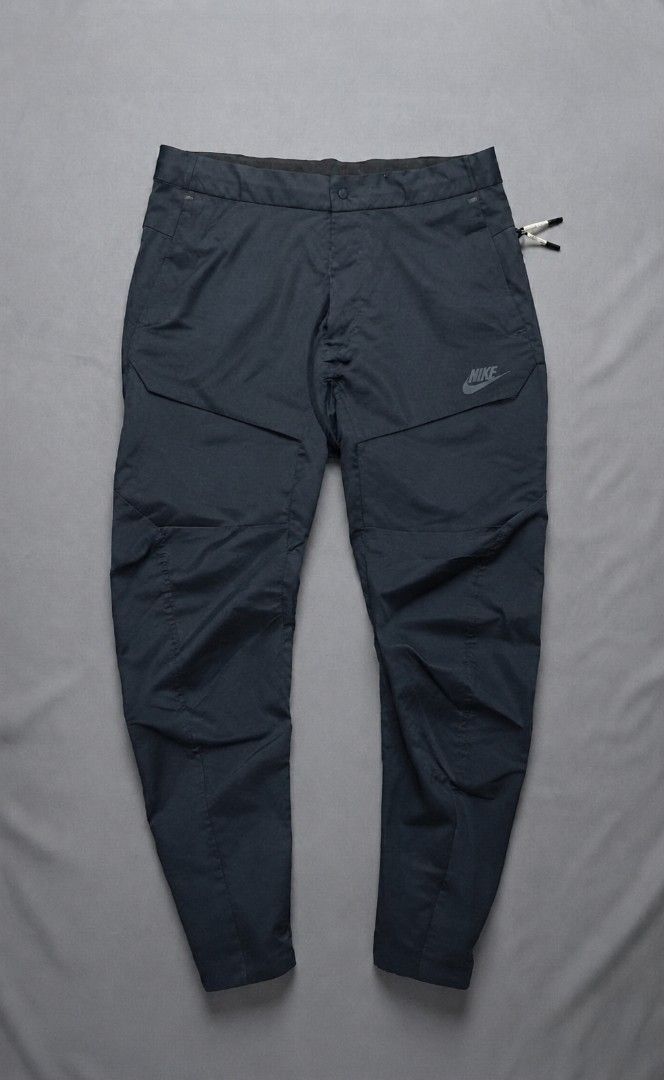 Nike tech pack woven pants (Category: Activewear) located in Manila. Submitted by brightcloud_25 (Listing ID 1453946921, Image 1). Description: Nike tech pack woven pants size medium fit 30 up to 32 length 38 excellent condition 950 + sf.