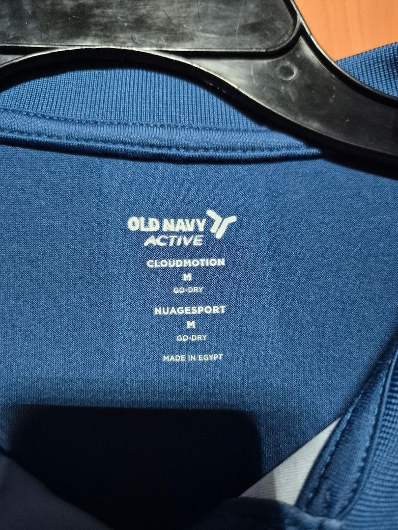 Old Navy Active Cloudmotion Go-Dry Polo Shirt - Size M (Category: Tshirts & Polo Shirts ) located in Manila. Submitted by jayveecatu14021 (Listing ID 1453893591, Image 2). Description: - Old Navy Active Polo Shirt - Features Cloudmotion and Go-Dry technology - Stylish blue and white geometric pattern - Ideal for sports or casual wear - Made in Egypt.