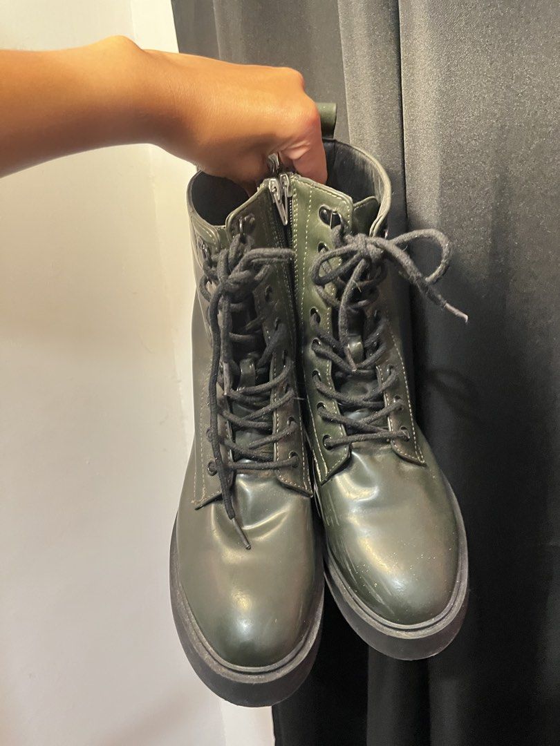 Olive Green Lace-up Platform Combat Boots (Category: Boots) located in Paranaque City. Submitted by agirlhasnoname_ (Listing ID 1453976866, Image 1). Description: - Cool olive green combat boots - Chunky platform sole - Lace-up front - Side zipper for easy wear - Adds an edgy vibe to any outfit.