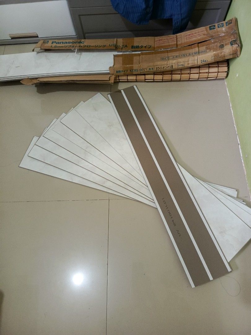 Panasonic 1.5mm Reform Flooring USJI-TA (Category: Carpets, Mats & Flooring) located in Irosin. Submitted by whanchore55263 (Listing ID 1453839849, Image 1). Description: - Brand: Panasonic - Thickness: 1.5mm - Feature: Heat-resistant - Design: Light marble-like pattern - Quantity: 18 sheets per box - Condition: Brand new, unused, original packaging - Ideal for: Home renovation projects.
