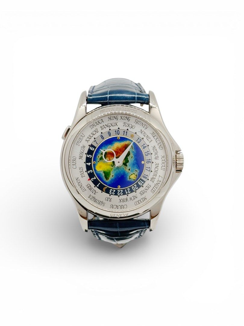 Patek Philippe Worldtime 5131G-001 (Category: Watches) located in Singapore. Submitted by montres.pickering (Listing ID 1453958791, Image 1). Description: A rare Patek Philippe Worldtime in a 39.5mm white gold case. Features a special cloissone enamel dial. Complete set with box and warranty papers. Warranty dated December 2012..