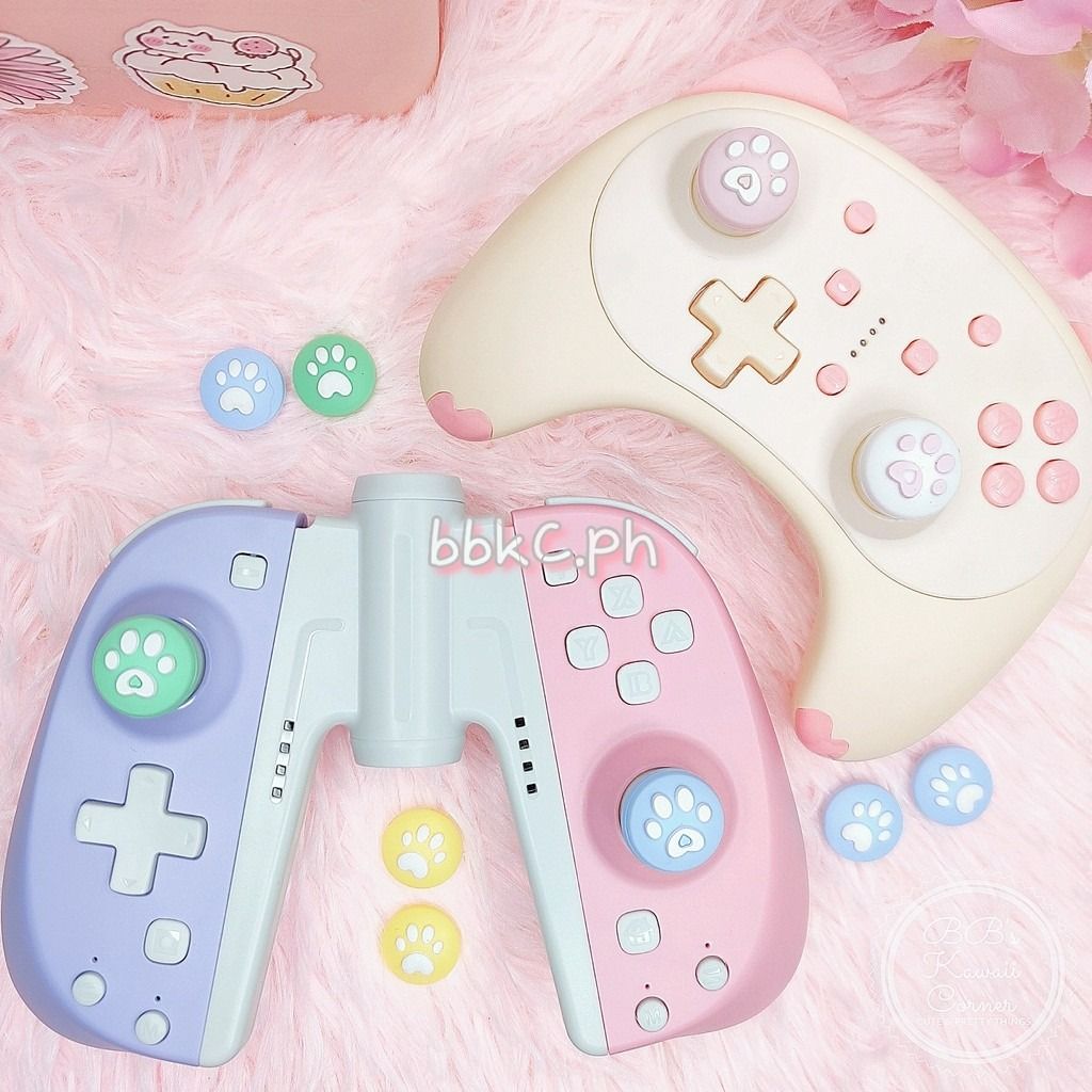 Paw Thumb Grips for Nintendo Switch / Switch Lite - 2pcs Yellow (Category: Controllers) located in Mandaluyong City. Submitted by bbkc.ph (Listing ID 1453631447, Image 2). Description: 🌸 Designed for Nintendo Switch & Switch Lite 🌸 Protects your original analog joysticks from dirt and wear and tear 🌸 May fit 3rd party controllers with small analog joysticks 🌸 Quantity: 2pcs 🌸 Material: Silicone 🌸 This variation has no cardboard packaging 🌸