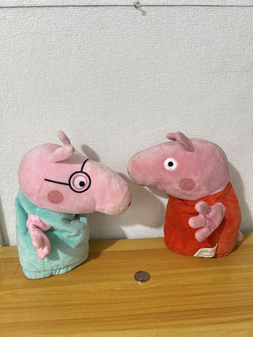 Peppa Pig Hand Puppet Plush (Category: Plushies & Soft Toys) located in Pateros City. Submitted by cleanmycloset (Listing ID 1453973111, Image 1). Description: Like new but Needs wash Preloved, unless stated brandnew. All items are declared AS IS. Pls manage your expectations. Can do tiiktokk checkout, courier apps, or self pick up. Payment first thru cashg or bank transfer. Coin is used for size comparison. .