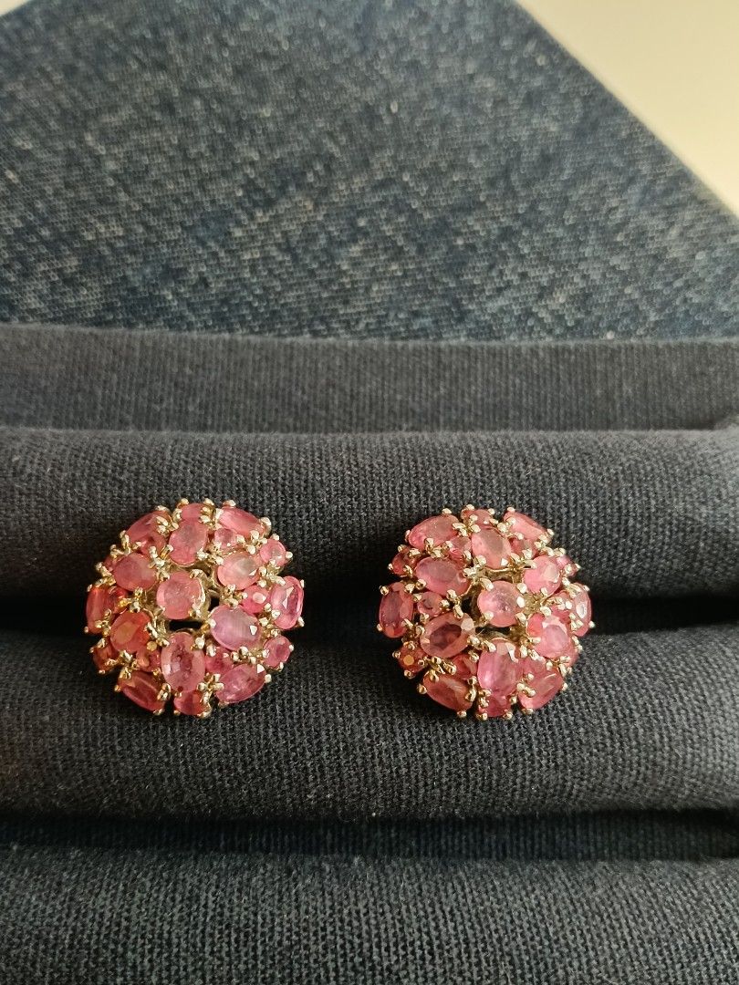Pink ruby Stud Earrings (Category: Earrings) located in Kuala Lumpur. Submitted by gg2323 (Listing ID 1453874425, Image 1). Description: - Pretty Burmese pink ruby gemstone cluster earrings - Round design with small oval-cut stones - Gold-tone metal setting - Secure clip-on backings - Perfect for adding a pop of color to any outfit.