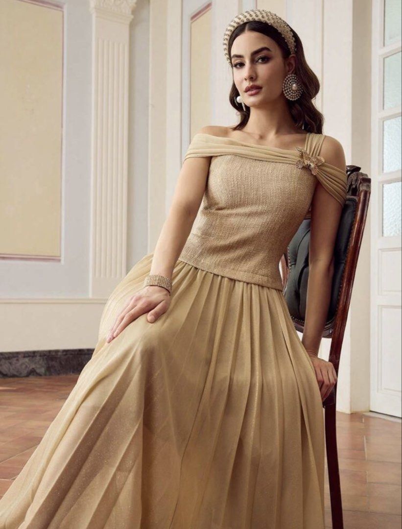 Pleated dress (Category: Evening dresses & gowns) located in Rizal. Submitted by decluttermommaa (Listing ID 1453875086, Image 2). Description: Used once. Color : Apricot Asymmetric Neck 2 n 1 Patchwork pleated dress .