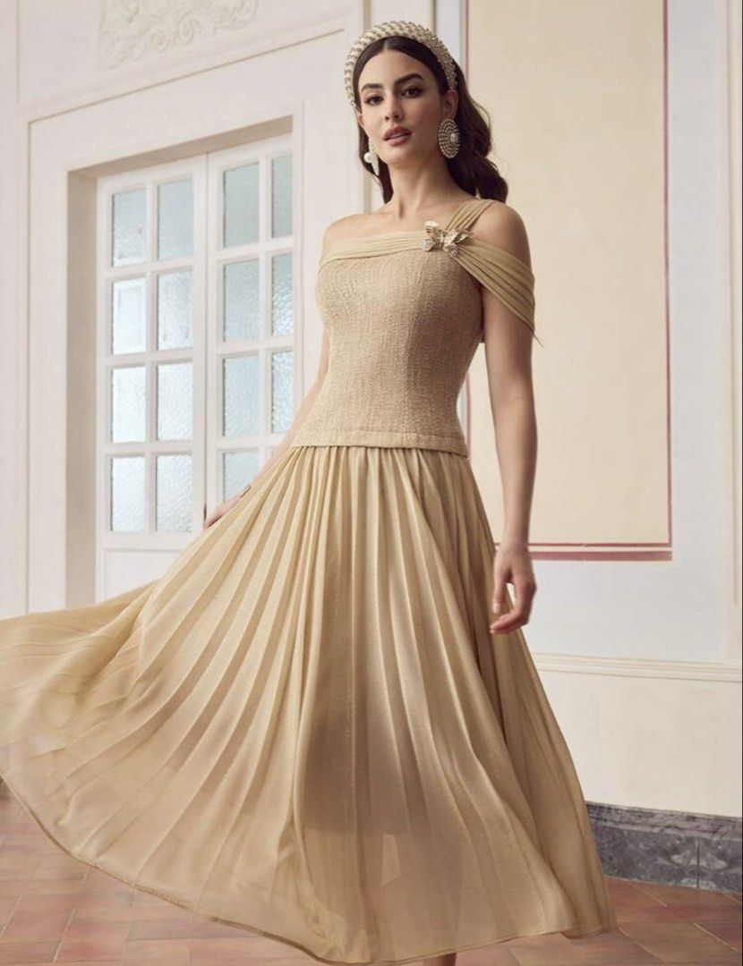 Pleated dress (Category: Evening dresses & gowns) located in Rizal. Submitted by decluttermommaa (Listing ID 1453875086, Image 1). Description: Used once. Color : Apricot Asymmetric Neck 2 n 1 Patchwork pleated dress .