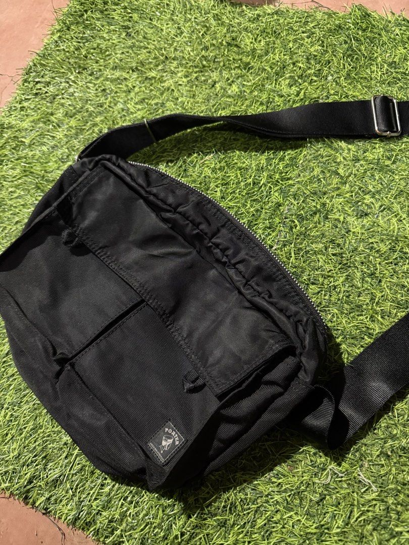 Porter International Tanker series (Category: Sling Bags) located in Quezon City. Submitted by macleen17 (Listing ID 1453986660, Image 2). Description: Porter International Tanker series The selected region features a black nylon crossbody bag from the Porter International Tanker series. This design is heavily inspired by military flight jackets, utilizing a lightweight, durable fabric with functional front compartments and an adjustable shoulder