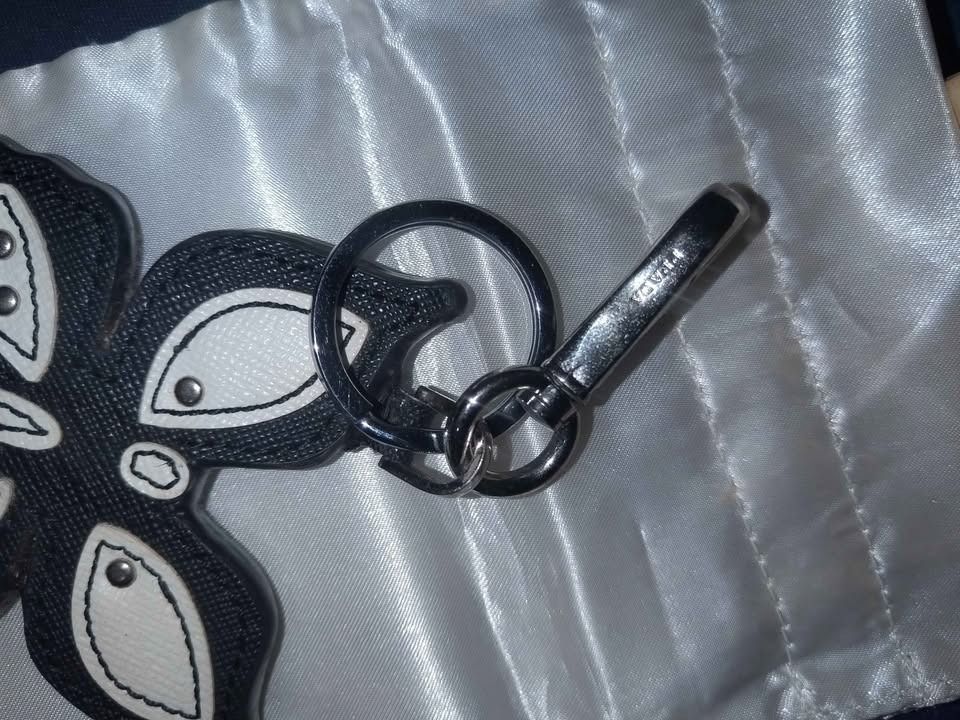 Prada Charm and keychain (Category: Luxury Accessories) located in Marikina City. Submitted by declutteringmomma2022 (Listing ID 1453998209, Image 2). Description: nego for sure buyer,location marikina .