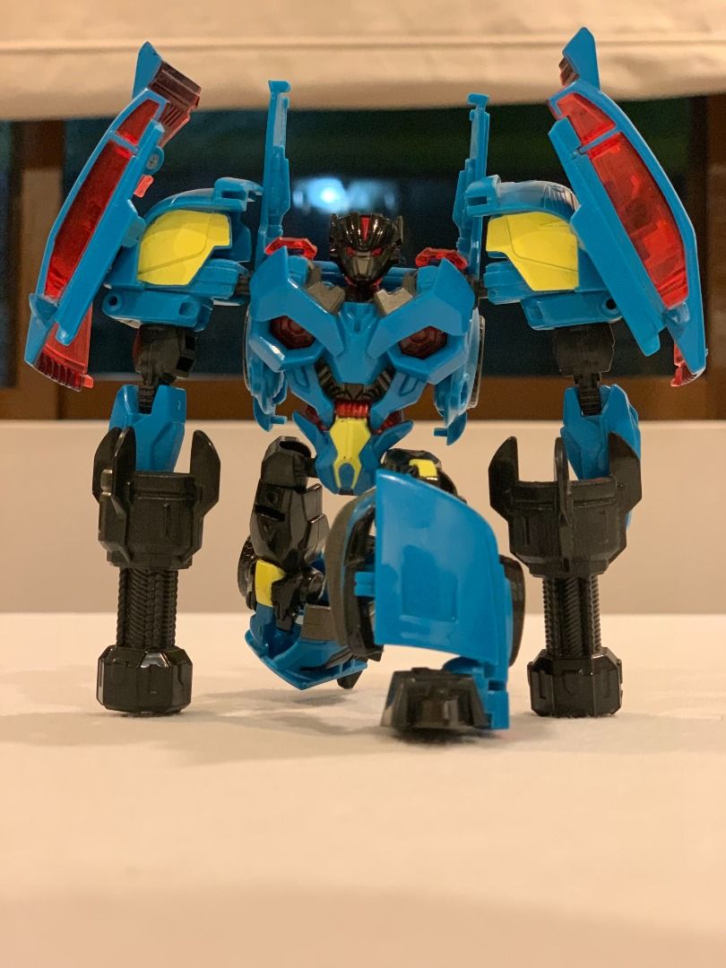 [PRELOVED] Transformers: Prime (RID) Authentic Deluxe Class Rumble (Category: Action & Battle Toys) located in Paranaque City. Submitted by juliusd23 (Listing ID 1453841545, Image 2). Description: Selling a pre-loved Deluxe Class Rumble from the official Transformers: Prime (Robots in Disguise) line! A fantastic, highly articulated mold featuring his iconic back-mounted piledrivers. Condition Assessment (8.5/10): - Completeness: 100% Complete — i