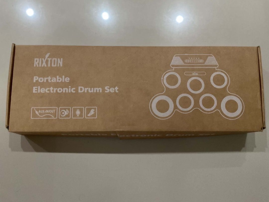 Rixton Portable Electronic Drum Set (Category: Musical Instruments) located in Manila. Submitted by rylansstuff (Listing ID 1453866743, Image 1). Description: - Rixton portable electronic drum set - Includes: drum pad, module, two speakers outlets cables, pedals - Comes with instruction manual - Ideal for practice or casual fun - Simple setup and user-friendly operation - Needs: small amplifier or headset, drum sticks PM for any more questions .