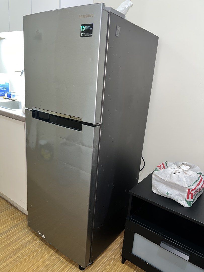 Samsung Digital Inverter Refrigerator (Category: Refrigerators and Freezers) located in Taguig. Submitted by rachelkristineee (Listing ID 1453866798, Image 3). Description: SELLING LOW: 5ft Samsung 2-door inverter refrigerator in good working condition. Cosmetic scratches and dents are present but is fully functional and works perfectly. Pick up loc: Grace Residences, Taguig .