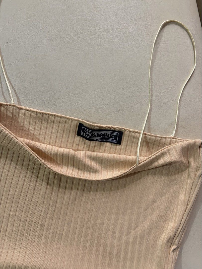 skintone/beige spaghetti strap top (Category: Sleeveless) located in Cainta. Submitted by comethruuu (Listing ID 1453859931, Image 2). Description: gifted to me years ago wore for taking pics only no flaws!.
