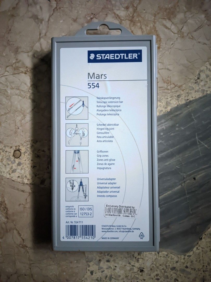[STAEDTLER] Mars 554 Compass Set (Category: Stationery & School Supplies) located in Manila. Submitted by chahrles (Listing ID 1453855820, Image 2). Description: - STAEDTLER Mars 554 compass set - Includes universal adapter - Includes telescopic extension bar - Ideal for technical drawing and geometry - Comes in original case - Made in Germany - Shows signs of dents and usage.