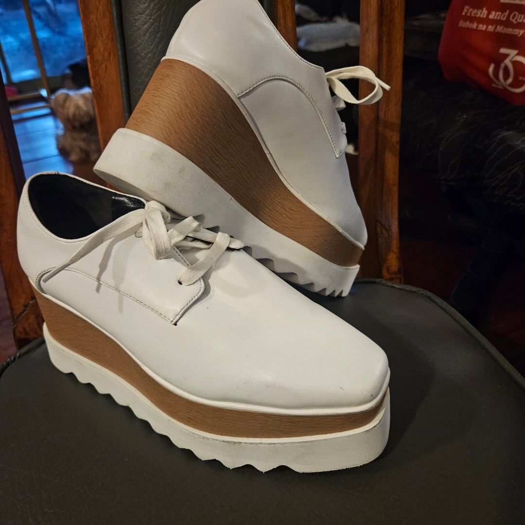 Stella McCartney Platform Wedge Oxford Shoes (Category: Loafers) located in Manila. Submitted by smartluxeph (Listing ID 1453853437, Image 3). Description: Stella McCartney Platform Wedge Oxford Shoes – Authentic 🇮🇹 ✨ Elevate your everyday look with these iconic Stella McCartney platform wedge lace-up shoes. Crafted in Italy with the brand's signature modern silhouette, they add height while remaining surprisingly comfortable. A timeless design
