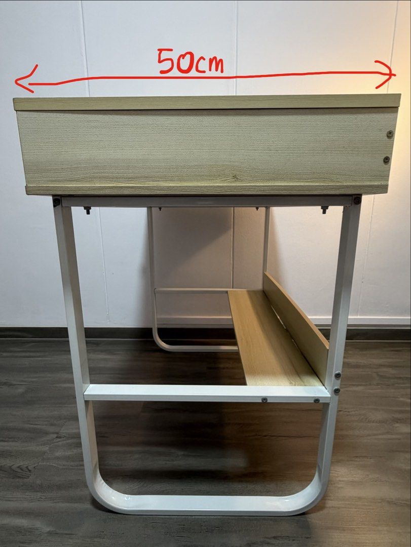 Study table (Category: Tables & Sets) located in Singapore. Submitted by snoopsi_123 (Listing ID 1453901769, Image 2). Description: Shelf and its backboard at the bottom of the table is slightly bent. Dimensions as shown in the photo. Pm for more info Self collect at 550258.
