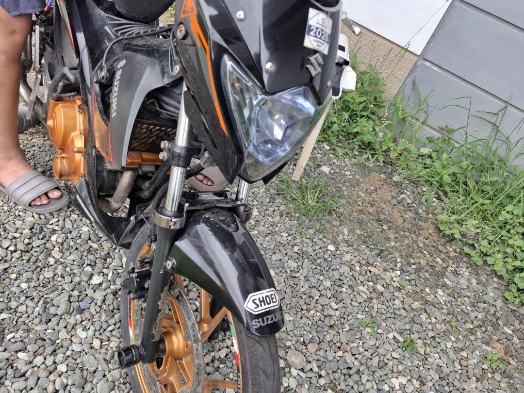 Suzuki Raider 150 with Yoshimura Exhaust (Category: Motorbikes for Sale) located in Manila. Submitted by liveeagle-c6d8 (Listing ID 1453881909, Image 2). Description: Suzuki Raider 150. Comes with a Yoshimura exhaust. Orange rims and accents. Black body with orange decals. Ready for the road. Check out the photos for more details..