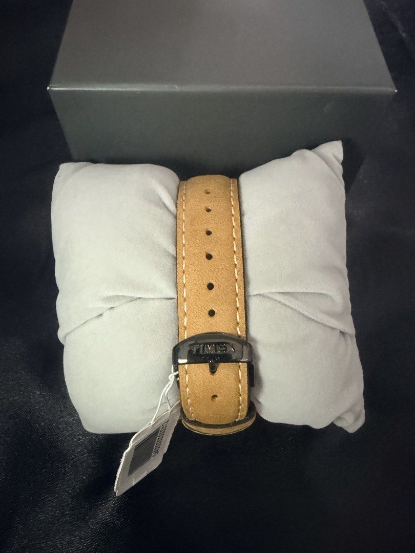 Timex Watch with Brown Leather Strap and Black Dial (Category: Women's Watches) located in Paranaque City. Submitted by aacc0920 (Listing ID 1453958584, Image 3). Description: - Timex watch with classic black dial - Comfortable brown leather strap with buckle closure - Convenient date display feature - Comes with original Timex box - Ideal for everyday wear.
