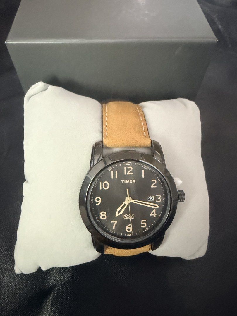 Timex Watch with Brown Leather Strap and Black Dial (Category: Women's Watches) located in Paranaque City. Submitted by aacc0920 (Listing ID 1453958584, Image 2). Description: - Timex watch with classic black dial - Comfortable brown leather strap with buckle closure - Convenient date display feature - Comes with original Timex box - Ideal for everyday wear.