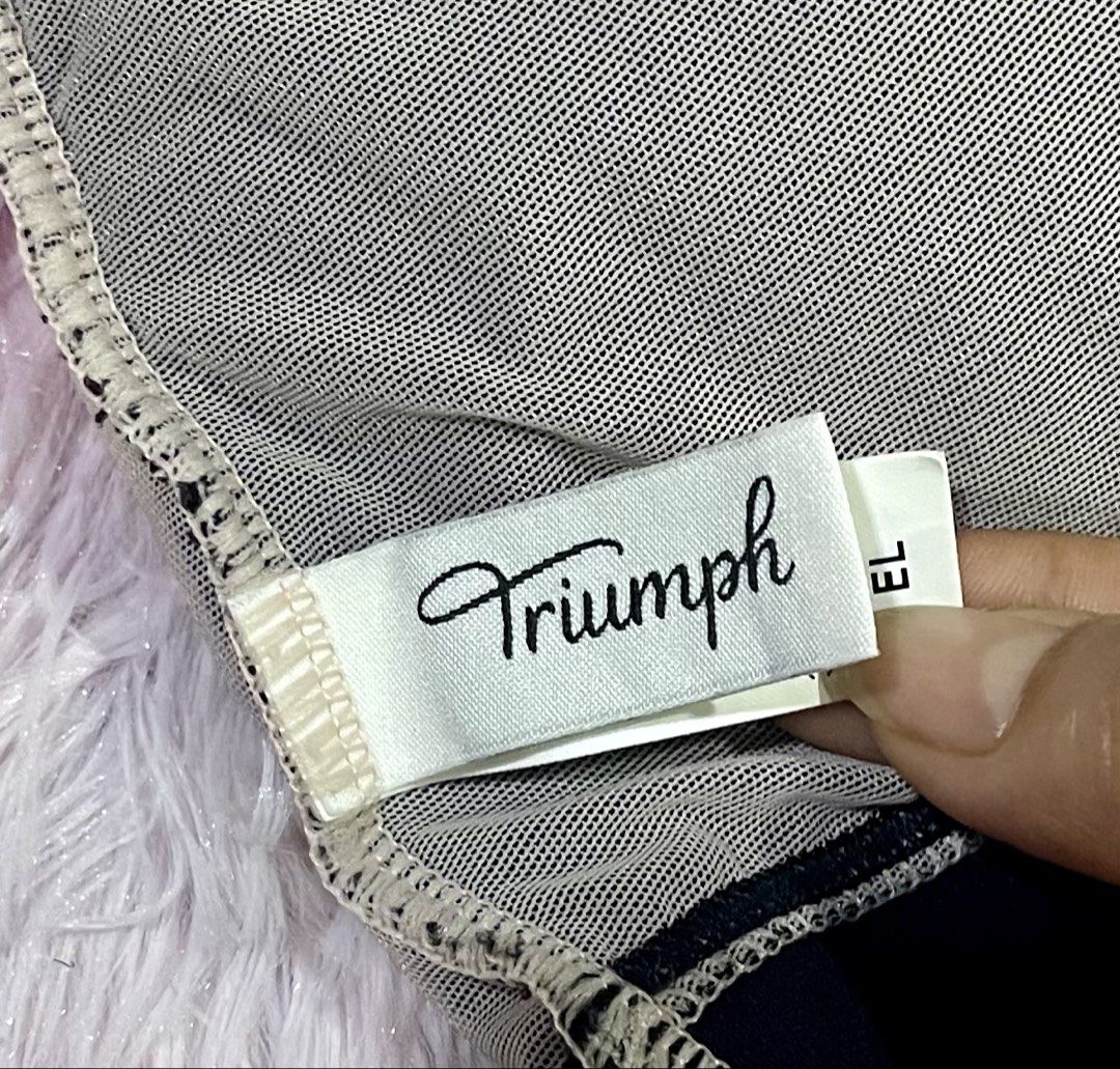 Triumph Black Lace Bra (Category: Undergarments & Loungewear) located in Caloocan City. Submitted by joycel06 (Listing ID 1453923855, Image 3). Description: - like new - Black Triumph bra with elegant lace overlay. - Features adjustable straps for a perfect fit. - Comfortable and stylish design. - Versatile for everyday wear or special occasions..