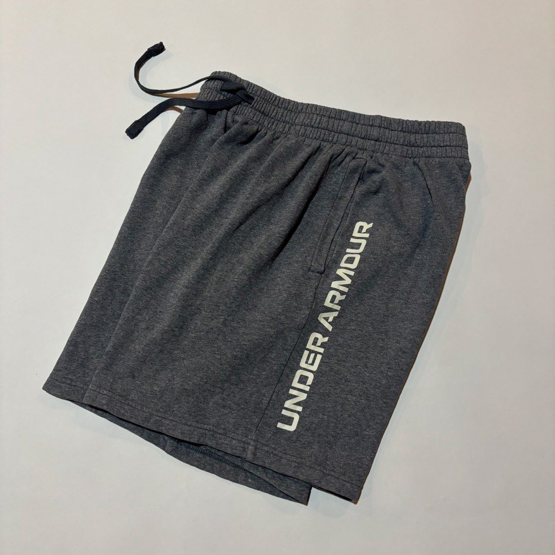 Under Armour Grey Sweat Shorts Size LG (Category: Shorts) located in Dipolog. Submitted by dionato (Listing ID 1453968818, Image 2). Description: 30-34x17.5 - Grey Under Armour sweat shorts - Size: Large (LG) fits to XL - Elastic waistband with drawstring - Under Armour logo on left leg - Text logo down the right side - Made in Vietnam - Ideal for lounging or workouts.