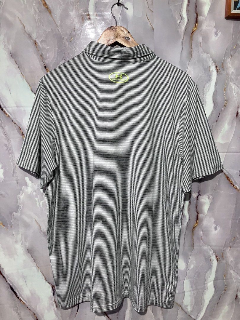 UNDER ARMOUR STRIPES GOLF POLO SHIRT (Category: Tshirts & Polo Shirts ) located in General Mariano Alvarez. Submitted by adonid (Listing ID 1453826776, Image 2). Description: ORIGINAL UNDER ARMOUR STRIPES GOLF POLO SHIRT GOOD CONDITION SIGN OF USAGE ONLY W44 L29.
