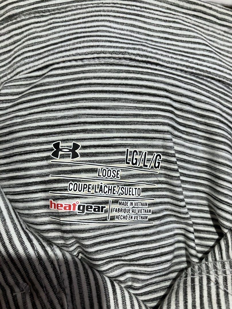 UNDER ARMOUR STRIPES GOLF POLO SHIRT (Category: Tshirts & Polo Shirts ) located in General Mariano Alvarez. Submitted by adonid (Listing ID 1453826776, Image 3). Description: ORIGINAL UNDER ARMOUR STRIPES GOLF POLO SHIRT GOOD CONDITION SIGN OF USAGE ONLY W44 L29.