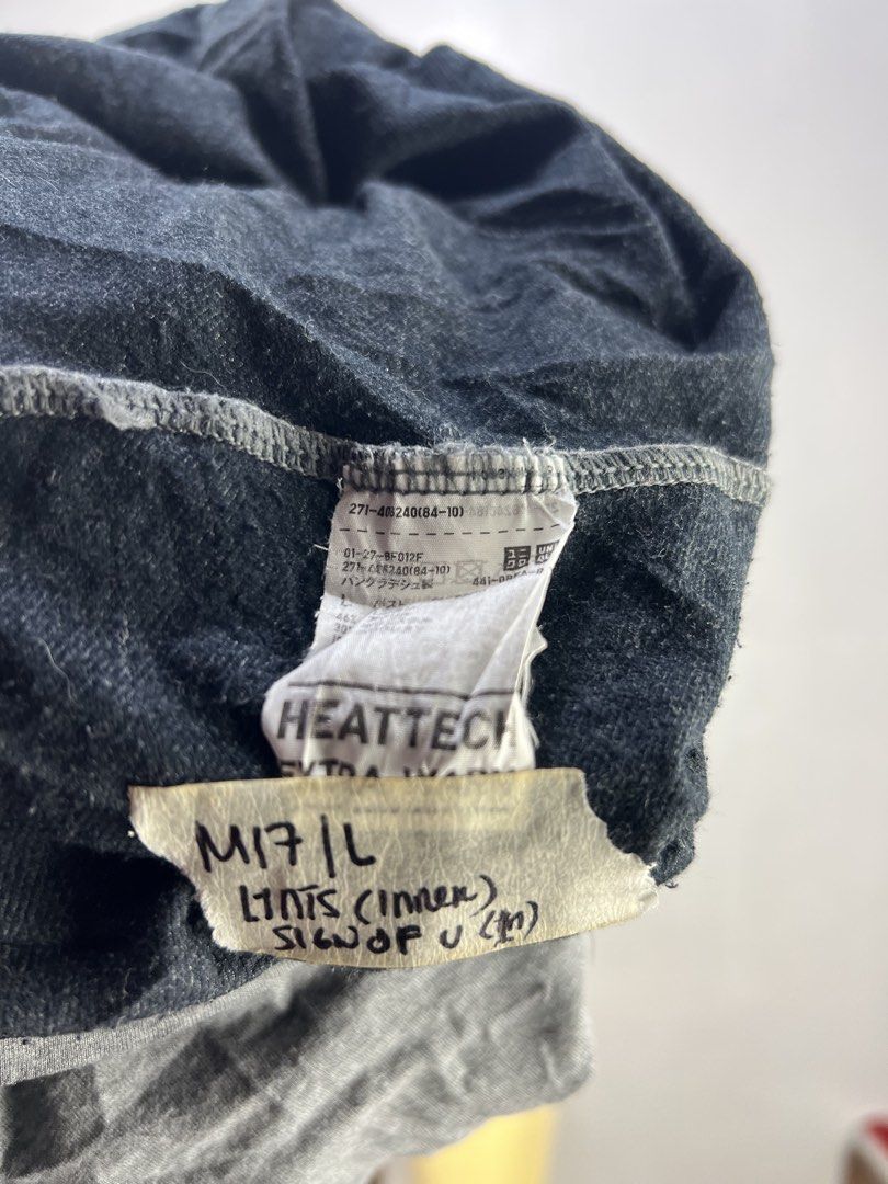 Uniqlo Heattech Extra Warm Long Sleeve Top (Category: Longsleeves) located in Baguio. Submitted by trenchcoats.ph (Listing ID 1453819846, Image 3). Description: - Uniqlo Heattech Extra Warm Long-Sleeved Top - Color: Dark Grey - Size: M (Inner label indicates L, but fits like a true Medium) - Ideal for layering during colder seasons - Made with soft and comfortable material.
