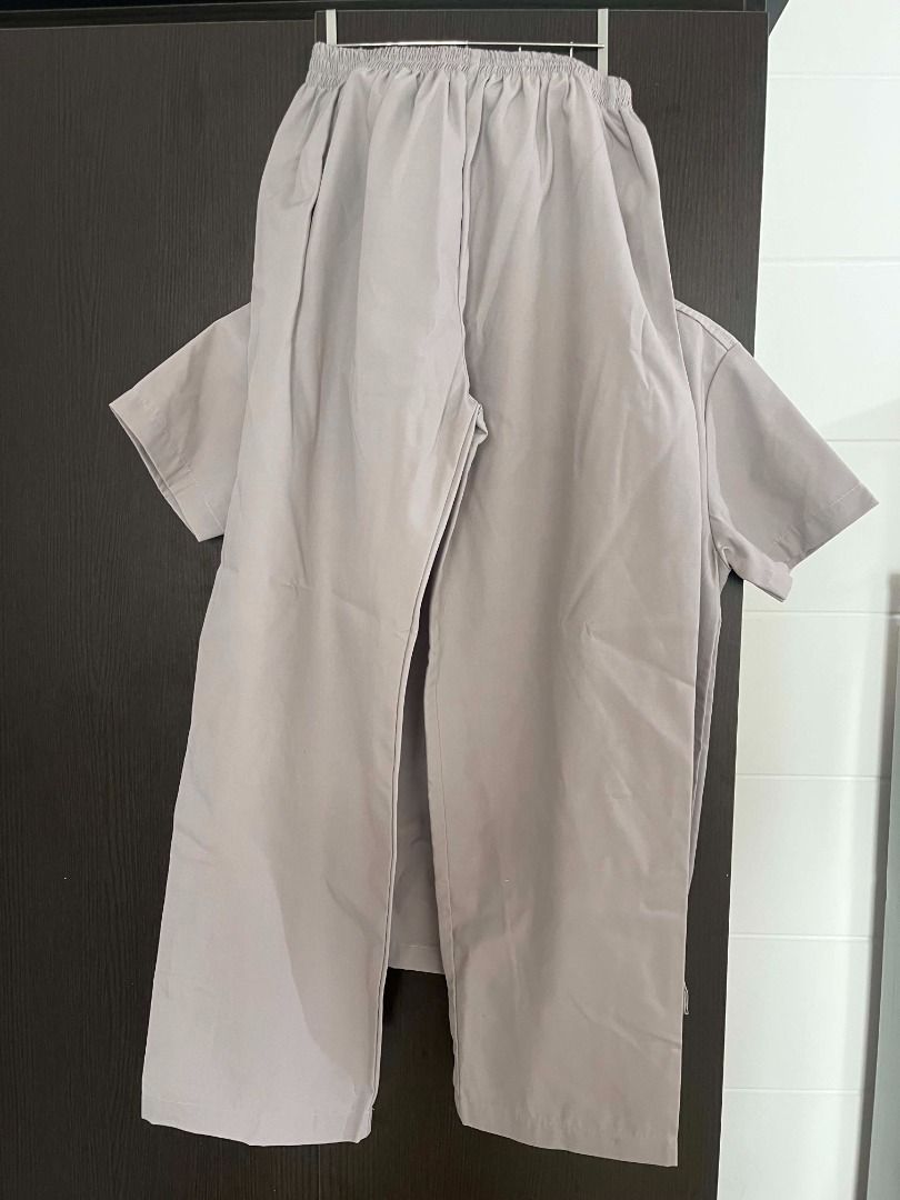 UST Nursing Scrub Top and Pants Set Medium (Category: Sets or Coordinates) located in Caloocan City. Submitted by gelgass (Listing ID 1453849016, Image 2). Description: - UST Nursing Scrub Set - Color: Light Grey - V-neck top with convenient pockets - Matching scrub pants - Ideal for nursing students and professionals - Comfortable and practical for long shifts.