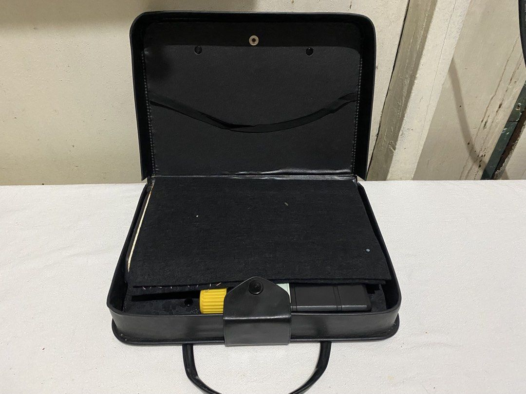 Vintage Chinese Calligraphy Set with Book and Case (Category: Stationery & School Supplies) located in Manila. Submitted by resi.diaz (Listing ID 1453839629, Image 2). Description: - Complete Chinese calligraphy set - Stylish black case with gold Chinese characters - Includes '中学新书写' calligraphy book - Comes with ink stone, brushes, and ink sticks - Perfect for beginners learning Chinese calligraphy - Case features a handle for easy portability.