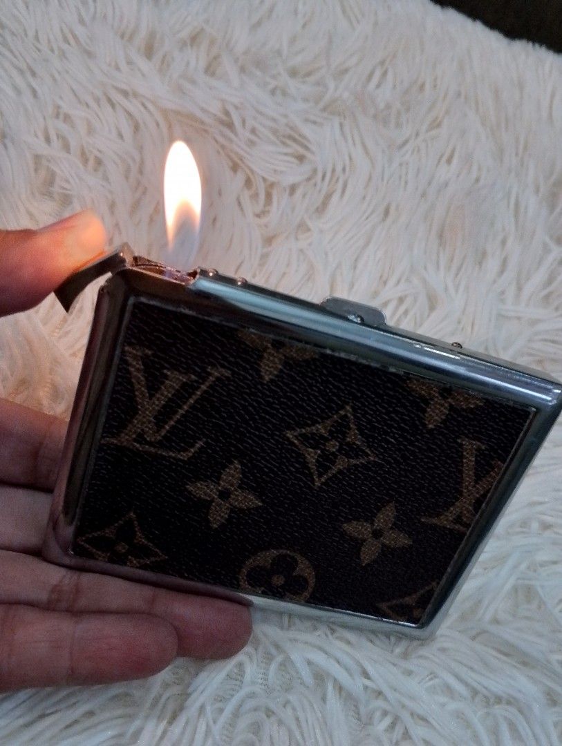 Vintage Louis Vuitton Monogram Cigarette Case with Working Lighter (Category: Luxury Accessories) located in Binangonan. Submitted by stufflikedat (Listing ID 1453906539, Image 3). Description: Vintage LOUIS VUITTON Monogram cigarette case with built-in refillable, detachable & working butane lighter, holds up to 10 cigs (72s) and can hold cash bills , IDs, business cards and credit cards in excellent working condition with minor scratches, clasp
