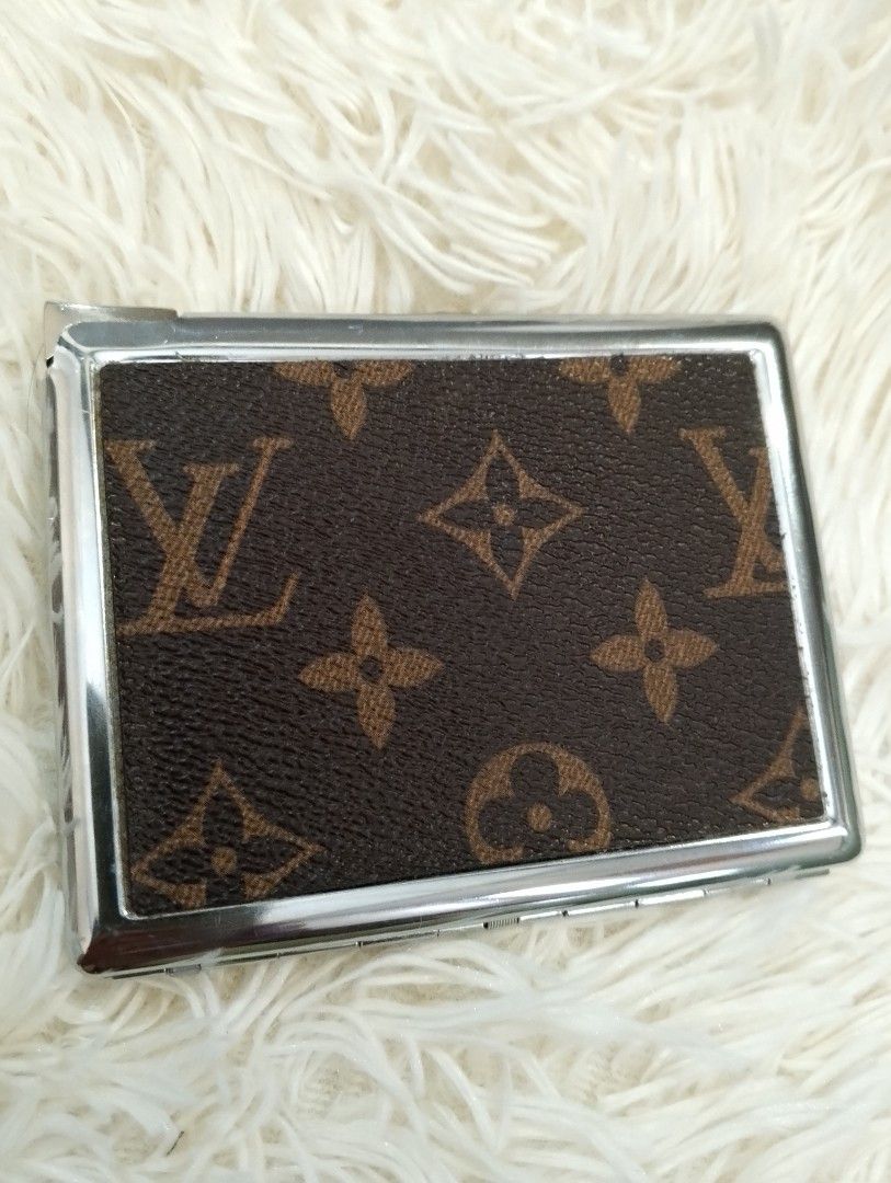 Vintage Louis Vuitton Monogram Cigarette Case with Working Lighter (Category: Luxury Accessories) located in Binangonan. Submitted by stufflikedat (Listing ID 1453906539, Image 2). Description: Vintage LOUIS VUITTON Monogram cigarette case with built-in refillable, detachable & working butane lighter, holds up to 10 cigs (72s) and can hold cash bills , IDs, business cards and credit cards in excellent working condition with minor scratches, clasp