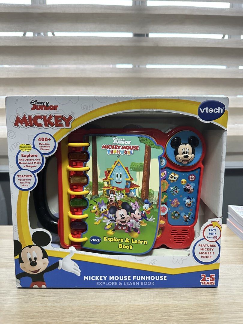 VTech Disney Junior Mickey Mouse Funhouse Explore & Learn Book (Category: Children's Books) located in Quezon City. Submitted by cruzstephieee (Listing ID 1447290650, Image 3). Description: 1,400 OFF!!!! - Interactive VTech book featuring Mickey Mouse Funhouse. - Teaches story time with Mickey, music, and problem-solving skills. - Includes character buttons and light-up buttons for engaging play. - Features 14 interactive pages filled with learni