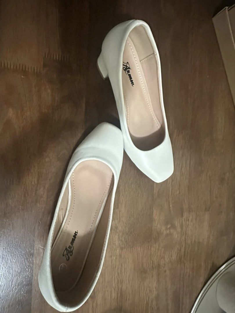 White Block Heels (Size 37) (Category: Heels) located in Manila. Submitted by naomituason_ (Listing ID 1453866412, Image 2). Description: White Block Heels (Size 37) 🤍 * Bought from Landmark * Like new – only used once for graduation * No damage or stains * Smooth faux leather finish * Comfortable block heels, perfect for formal events, office wear, or everyday outfits.