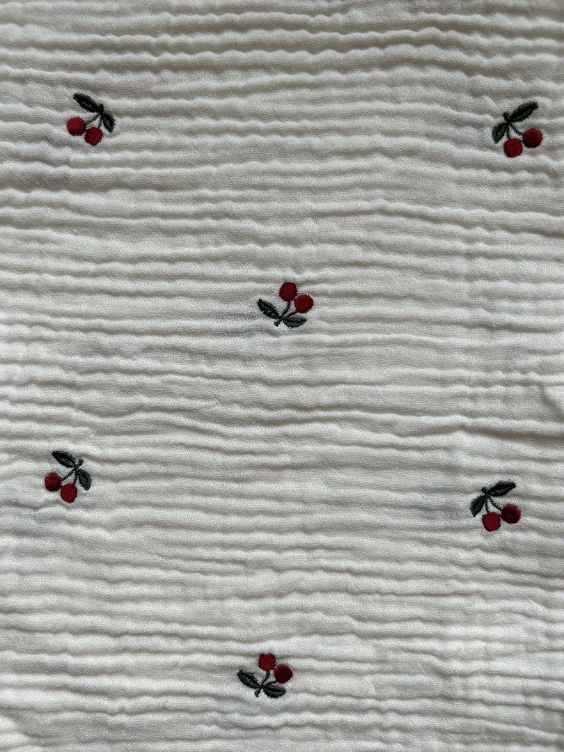 white muslin swaddle blanket (Category: Baby Toiletries & Grooming) located in Cebu City. Submitted by yjainani (Listing ID 1453988849, Image 3). Description: featuring a red cherry embroidered pattern. suitable for nursing cover.