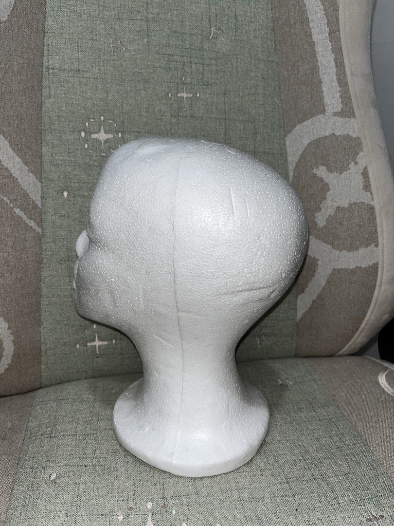 White Styrofoam Mannequin Head Display (Category: Hair Accessories) located in Manila. Submitted by gentleowl7 (Listing ID 1453984055, Image 3). Description: - White styrofoam head - Ideal for displaying wigs, hats, or jewelry - Smooth surface for crafting and styling practice - Lightweight and easy to handle - Stable base for freestanding display - Great for shop displays or personal use.