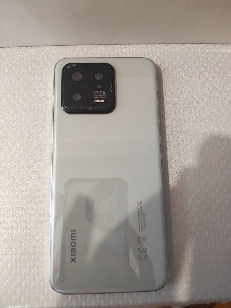 Xioami 13 (Category: Xiaomi) located in Quezon City. Submitted by tommychristian (Listing ID 1453930740, Image 3). Description: Xiaomi 13 (Global Variant) Specs: Snapdragon 8 Gen 2 processor 8GB ram 6.36" AMOLED display, 120Hz refresh rate Leica-tuned triple camera (50MP main) 4500mAh battery, 67W fast charging Xiaomi HyperOS 2.0 version 2.0.203.0.VMCMIXM / Android 15 Good condition / 8/10 — minor signs of use, fully functional. Has little scratc