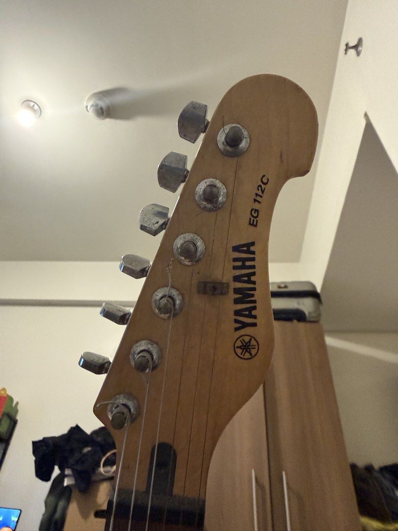 Yamaha EG112C Electric Guitar (Category: Musical Instruments) located in Manila. Submitted by polyesterspliff (Listing ID 1453903872, Image 3). Description: Red Yamaha EG112C Electric Guitar Very negotiable Only Issues: Chip on the bottom back Guitar only Still works .