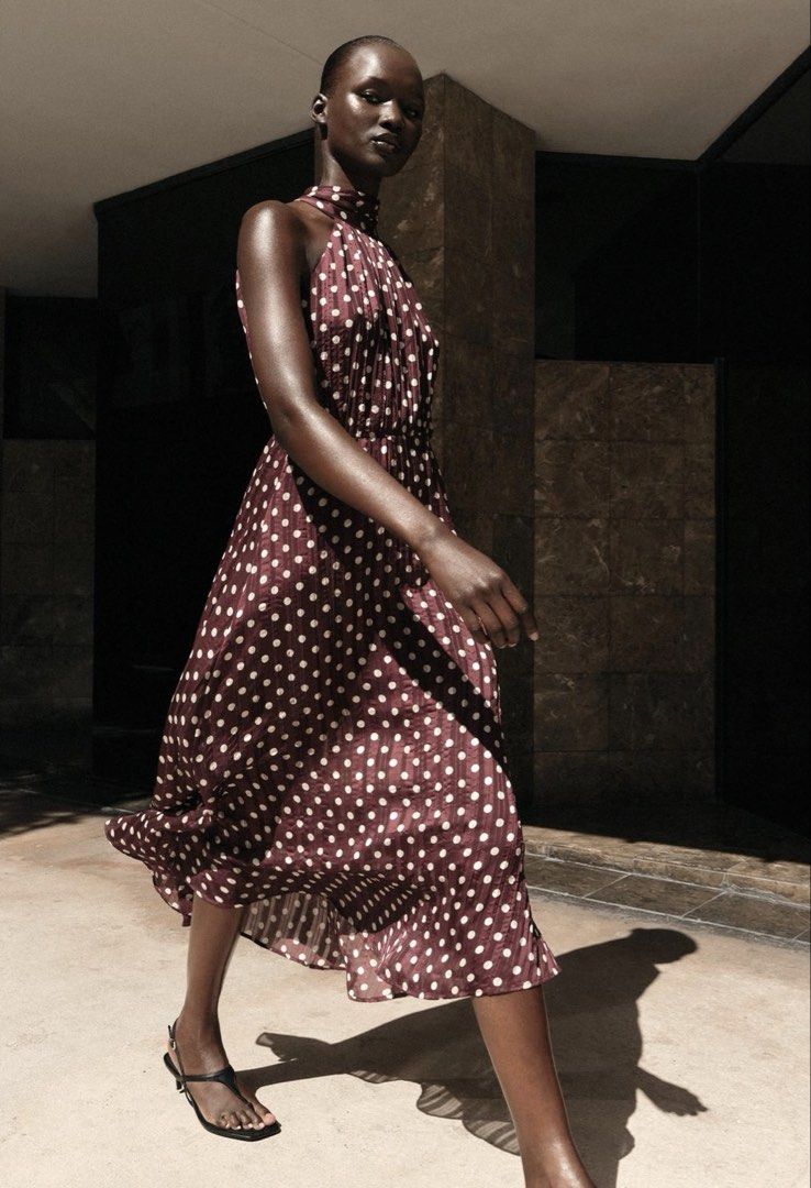Zara Polka dot midi dress (Category: Dresses) located in Pasig City. Submitted by redeem (Listing ID 1453856298, Image 3). Description: AVAILABLE ON HAND‼️ BRAND NEW WITH TAG‼️ SIZE: SMALL Description: Halter neck dress in crinkled-effect fabric. Features an inner lining anc back fastening with an invisible zip and hidden buttons. ECRU / MAROON.