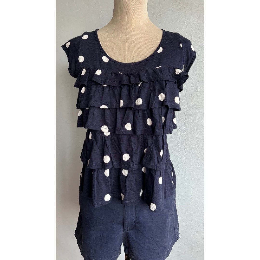Zara Trafaluc Blouse Shirt Top (Category: Blouses) located in Quezon City. Submitted by all_items_50_each (Listing ID 1453951665, Image 2). Description: Trafaluc by Zara Tiered Ruffle Top Polka dots, layered frills Size on tag: M *some red stains (pic 8) Measurements posted for reference Actual pics posted, pa browse nalang po NO WW 💲ALL ITEMS 50 💰MOP: GCASH ➕Add shipping fee ❌NO rush shipping, meet up, haggling ✔️for rush, use grab/lalamove 🚫
