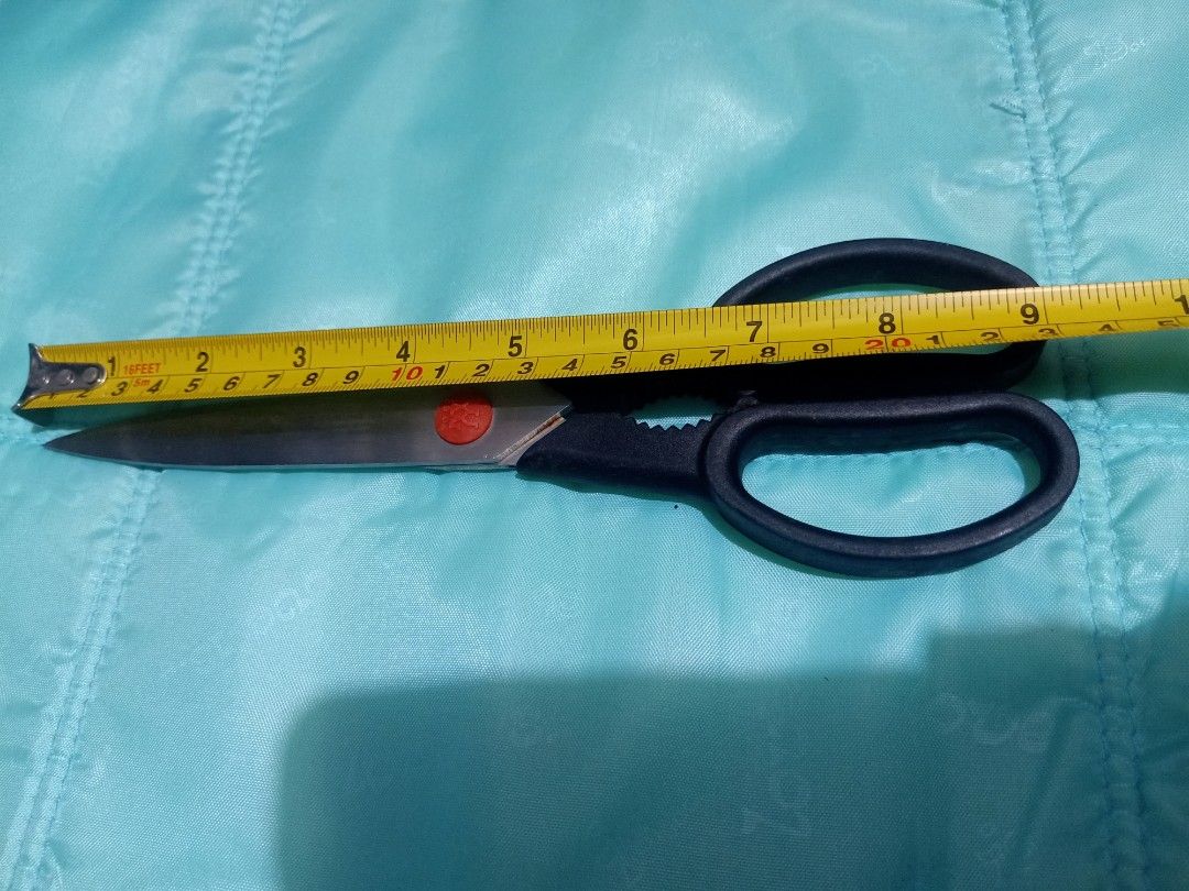 Zwilling Twin L Kitchen Shears Made in Germany (Category: Other Kitchenware & Tableware) located in Pasig City. Submitted by urdal01 (Listing ID 1453947188, Image 2). Description: - Zwilling Twin L Kitchen Shears - Made in Germany - Approximately 8-inch blade length - Comfortable black handles - Ideal for kitchen tasks and general use - Sharp and durable quality.