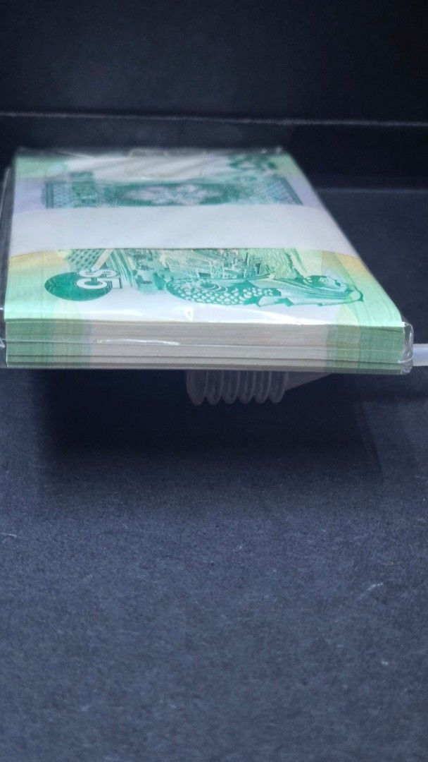 $5 stack (Category: Currency) located in Singapore. Submitted by vin3992 (Listing ID 1454043138, Image 3). Description: Singapore ship series $5 stack 100pcs running number.