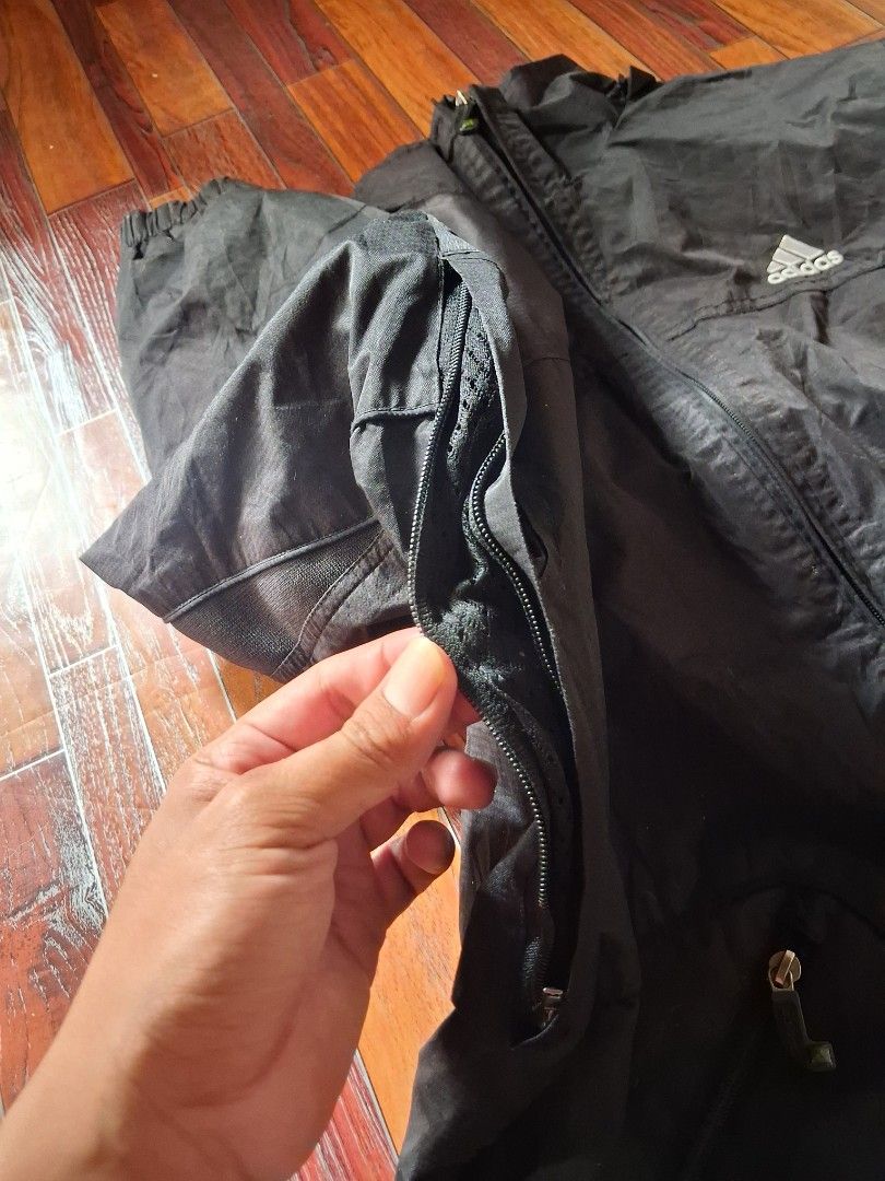 Adidas Black Track Jacket with 3 Stripes (Category: Coats, Jackets and Outerwear) located in Cavite. Submitted by eks1999 (Listing ID 1454057386, Image 3). Description: - Classic black Adidas jacket - Iconic 3 stripes on sleeves - Zippered pockets for essentials - Perfect for sports or casual wear - Lightweight and comfortable - Great for layering.