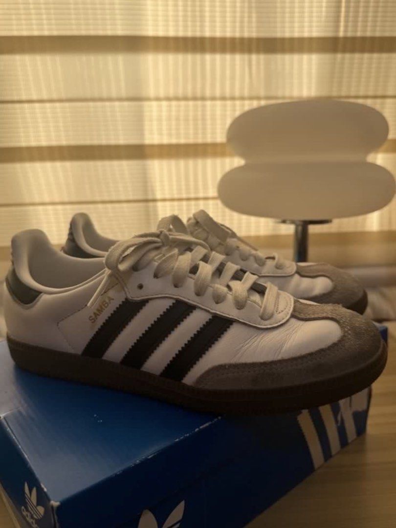 Adidas Samba OG (Category: Sneakers) located in Manila. Submitted by declutterdoctor (Listing ID 1454154226, Image 2). Description: - Adidas Samba OG - Size: UK 6 / US 6.5 / EU 38.5 / 240cm - Color: White leather with black stripes - Features: Grey suede toe cap, gum sole - Condition: Original box included.