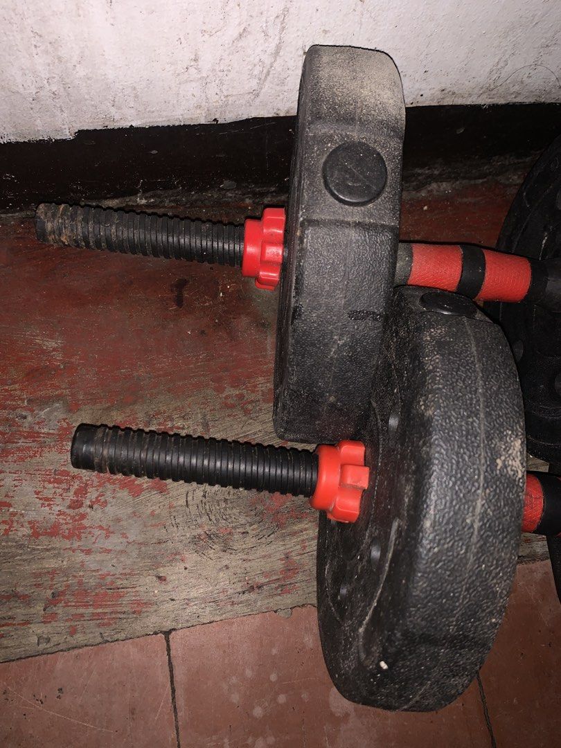 Adjustable Dumbbell Set with Weight Plates (Category: Weights & Dumbbells) located in Manila. Submitted by superliyooo (Listing ID 1454013615, Image 2). Description: 10 Plates of 3KG 4 Plates of 2.5KG - Adjustable dumbbell set perfect for home workouts. - Comes with multiple weight plates for customizable resistance. - Features comfortable grip handles for a secure hold. - Fully functional, showing some signs of wear from regular use. - Sold as a