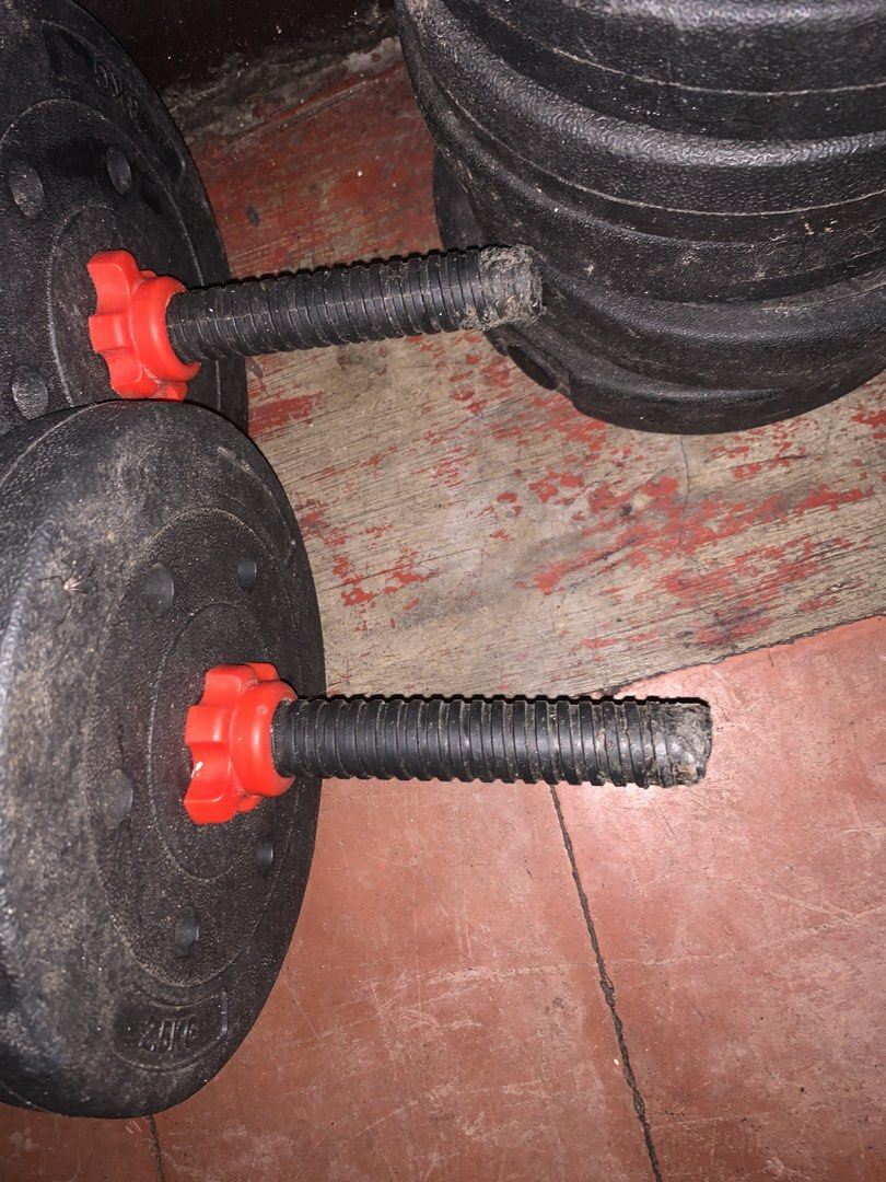 Adjustable Dumbbell Set with Weight Plates (Category: Weights & Dumbbells) located in Manila. Submitted by superliyooo (Listing ID 1454013615, Image 3). Description: 10 Plates of 3KG 4 Plates of 2.5KG - Adjustable dumbbell set perfect for home workouts. - Comes with multiple weight plates for customizable resistance. - Features comfortable grip handles for a secure hold. - Fully functional, showing some signs of wear from regular use. - Sold as a