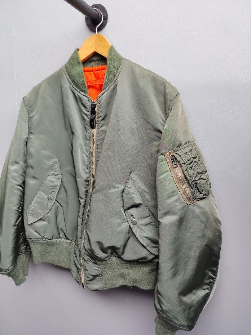 Alpha Industries MA - 1 Flight Jacket (Reversible) (Category: Coats, Jackets and Outerwear) located in Taguig. Submitted by _theroom.ph (Listing ID 1454024751, Image 3). Description: Alpha Industries MA - 1 Flight Jacket (Reversible) Size Medium Boxy 24.5 x 24.5 Excellent Condition 2.5k + Shipping Fee Taguig City Loc 📥📥.