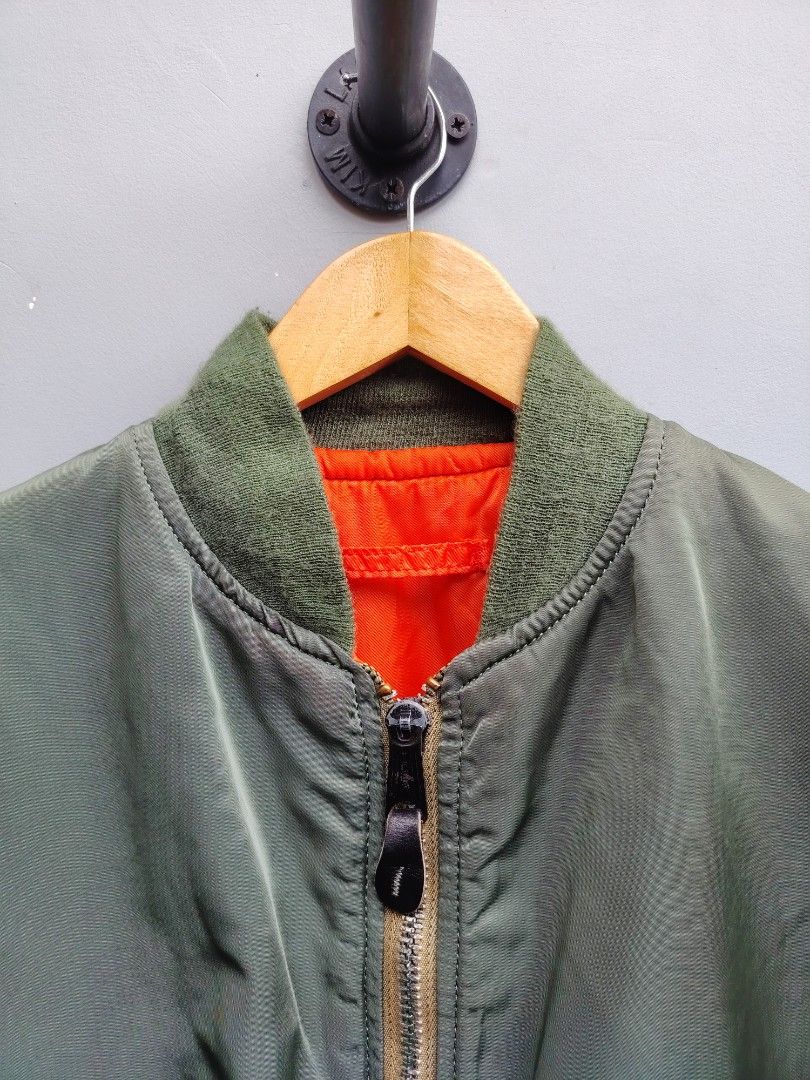 Alpha Industries MA - 1 Flight Jacket (Reversible) (Category: Coats, Jackets and Outerwear) located in Taguig. Submitted by _theroom.ph (Listing ID 1454024751, Image 2). Description: Alpha Industries MA - 1 Flight Jacket (Reversible) Size Medium Boxy 24.5 x 24.5 Excellent Condition 2.5k + Shipping Fee Taguig City Loc 📥📥.