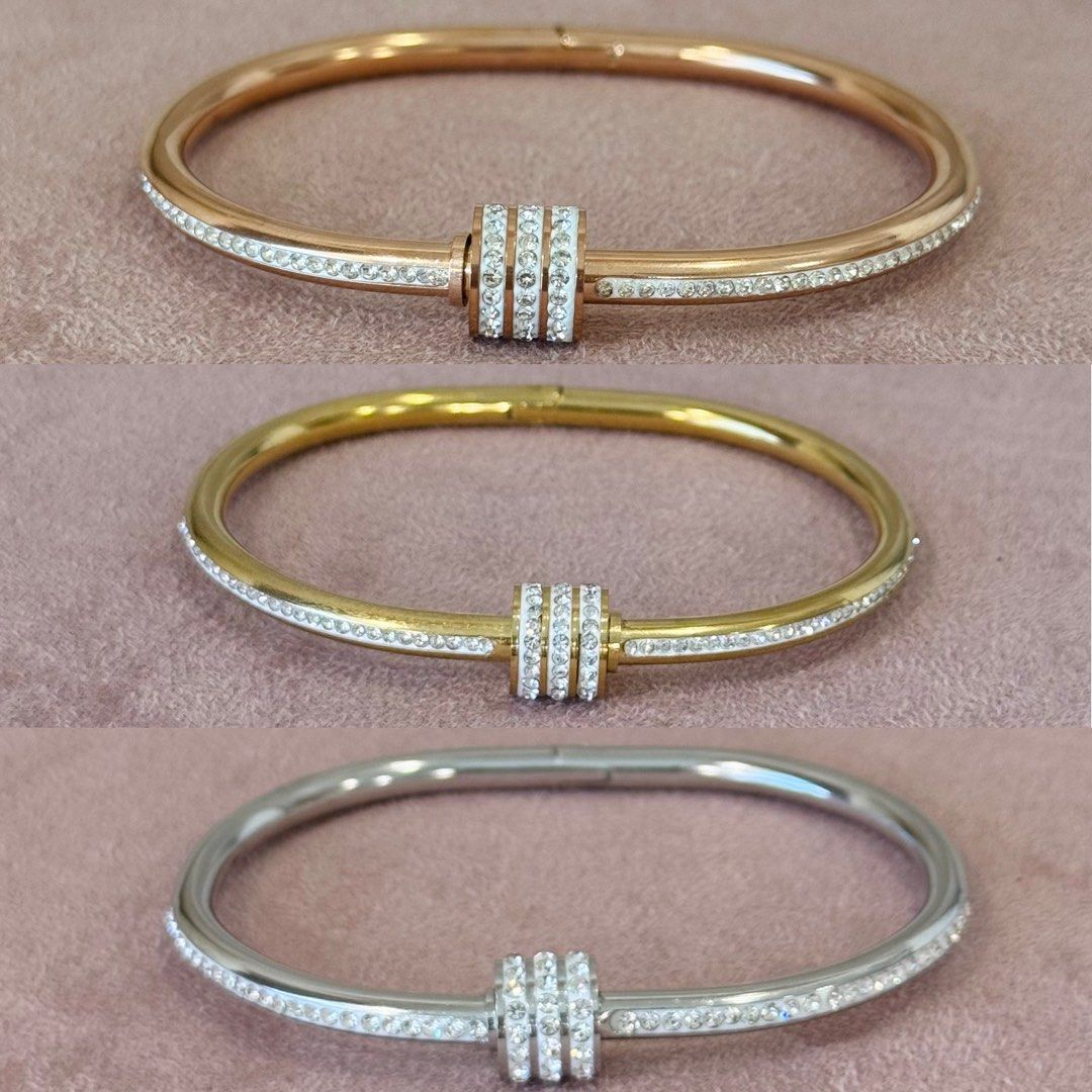 Assorted Bangles (Category: Bracelets) located in Singapore. Submitted by jewelryave_sg (Listing ID 1454064855, Image 2). Description: Diamond Simulant Gold Plated Ring (Heart and Star Ring) Assorted Bangles Gold-plated Stainless Steel. Cubic Zirconia Includes: ✔️Jewelry pouch ✔️Polishing cloth.