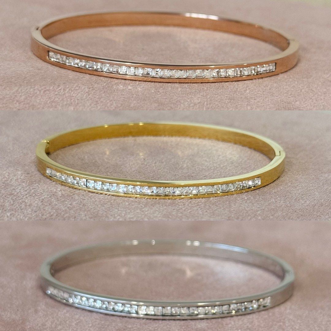 Assorted Bangles (Category: Bracelets) located in Singapore. Submitted by jewelryave_sg (Listing ID 1454064855, Image 1). Description: Diamond Simulant Gold Plated Ring (Heart and Star Ring) Assorted Bangles Gold-plated Stainless Steel. Cubic Zirconia Includes: ✔️Jewelry pouch ✔️Polishing cloth.