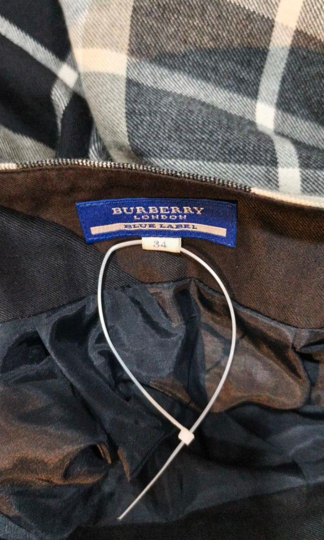 Authentic Burberry Plaid Skirt Size EU34 (Category: Skirts) located in Aguinaldo. Submitted by designerlaneph (Listing ID 1454155756, Image 3). Description: Previously owned Burberry plaid skirt size EU34 💯% authentic in nice condition free shipping onhand.